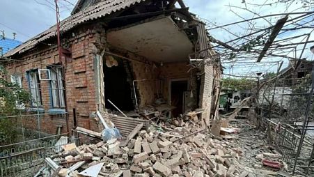 A house is damaged by Russian strikes on the town of Nikopol, Ukraine.