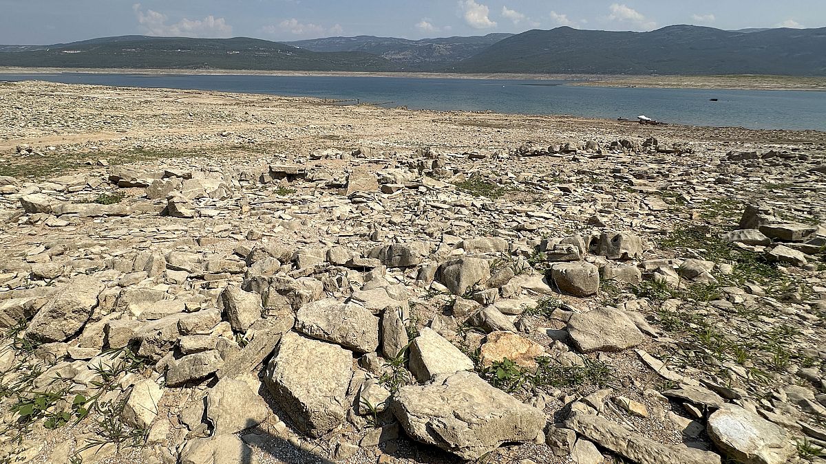 The dried up Bileca lake, near the town of Bileca, Bosnia, Thursday, Sept. 5, 2024. 