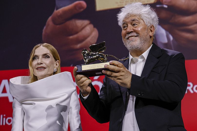 Pedro Almodovar, right, winner of the Golden Lion for 'The Room Next Door', alongside jury president Isabelle Huppert