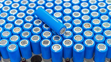 Rows of blue lithium-ion industrial high current batteries 