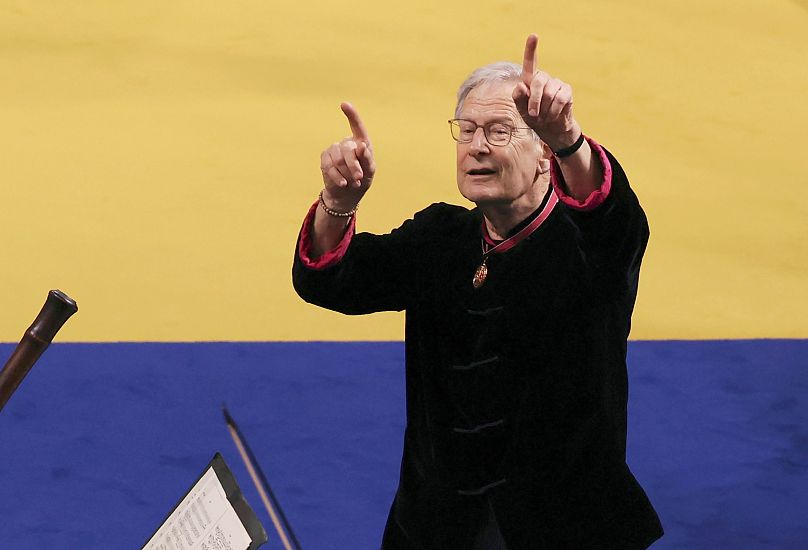 Conductor John Eliot Gardiner leads musicians as they perform in Westminster Abbey, ahead of the coronation of King Charles III and Camilla, the Queen Consort, in London