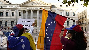 Supporters of Edmundo Gonzalez take part in a protest in Madrid, Spain, Tuesday, Sept. 10, 2024.