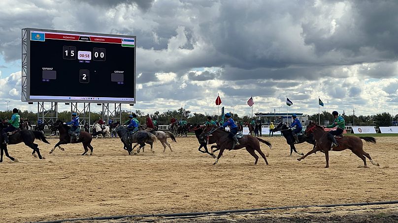 Kokpar involves two teams of four players on horseback, who race to grab the carcass from the centre of the field and drop it into the opposing team's goal.