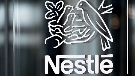 Nestle's logo is displayed on a window, during the 2018 full-year results press conference of the food and drinks giant Nestle, in Vevey, Thursday, Feb. 14, 2019. 