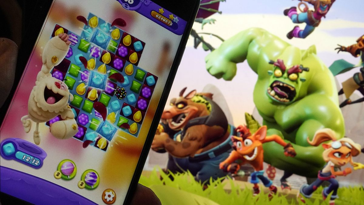 Scenes from "Candy Crush Saga," left, by Activision Blizzard, and "Crash Team Rumble," from Activision Publishing, in New York, Wednesday, June 21, 2023.