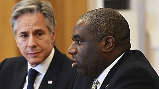 US Secretary of State Antony Blinken, left, listens as UK Foreign Secretary David Lammy, right, speaks during the Fourth Crimea Platform Leaders Summit in Kyiv, Ukraine.