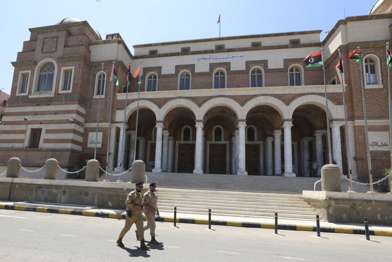 Libyan soldiers guard the Central Bank headquarters in Tripoli, August 2024