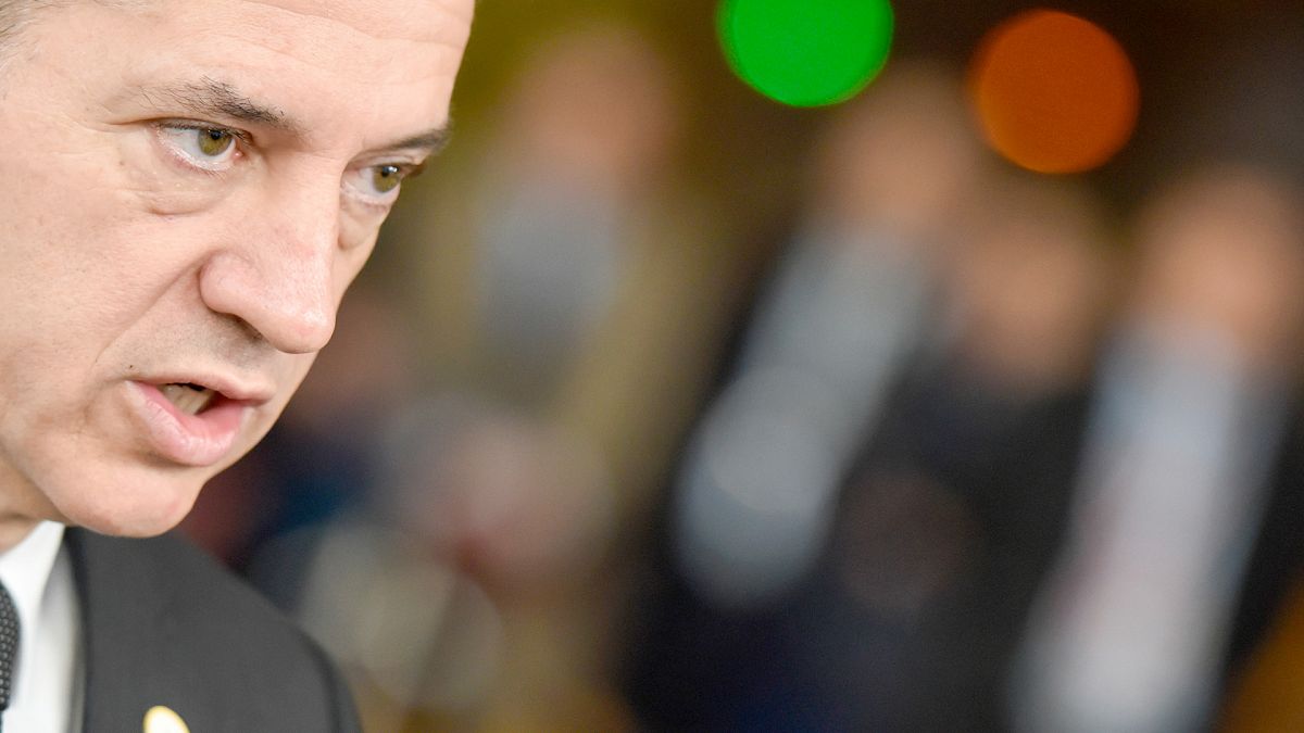 Slovenia's Prime Minister Robert Golob speaks with the media as he arrives for an EU summit in Brussels, 18 April 2024