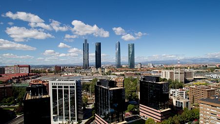 Skyscrapers known as the four towers are seen in the business district in Madrid, Spain Wednesday Sept. 26, 2012. (AP Photo/Paul White)