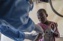 FILE - A health worker attends to an mpox patient, at a treatment center in Munigi, eastern Congo, Aug. 19, 2024.