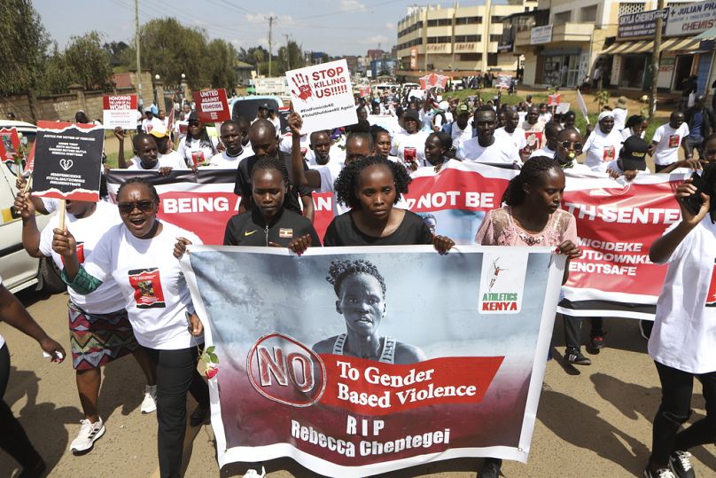 Activists and relatives of Ugandan Olympic athlete Rebecca Cheptegei march calling for an end to femicide in the western city of Eldoret, in Rift Valley, Kenya Friday, Sept. 1