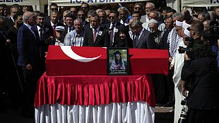 People attend funeral prayers for Aysenur Ezgi Eygi, a 26 year-old Turkish-American activist killed by the Israeli military, outside the central mosque of Didim, Turkey, Satur