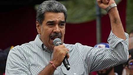 FILE - Venezuela's President Nicolas Maduro addresses government loyalists in Caracas, Venezuela, Aug. 28, 2024