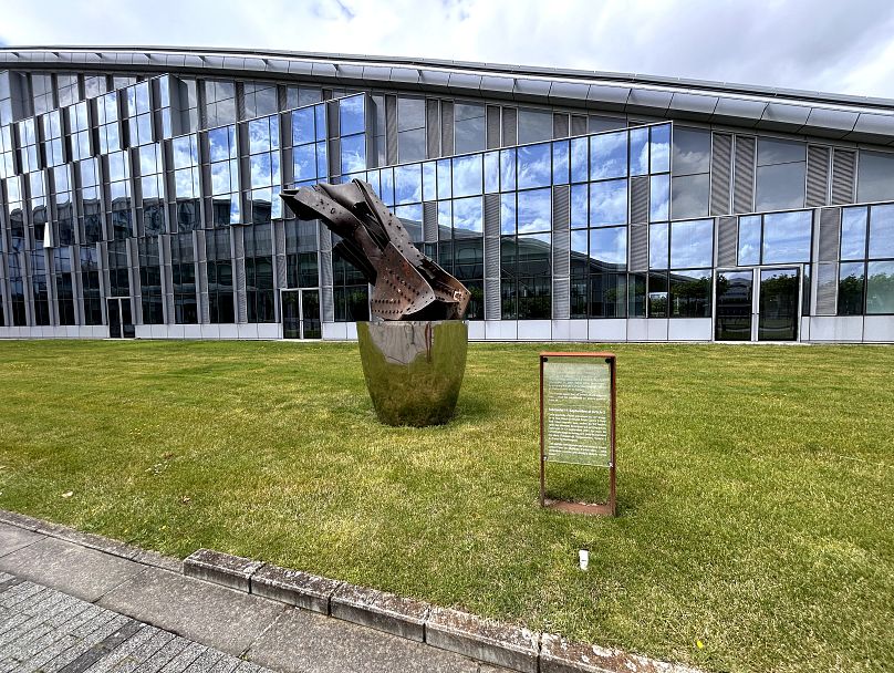 A remnant of the Twin Towers is displayed outside NATO HQ in tribute to the alliance's solidarity after the 9/11 attacks.