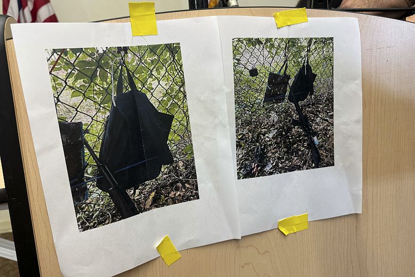 Photos that show an AK-47 rifle, a backpack and a Go-Pro camera on a fence outside Trump International Golf Club, September 15, 2024