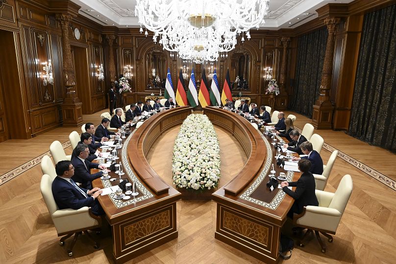 Uzbekistan's President Shavkat Mirziyoyev, left, and German Chancellor Olaf Scholz hold talks in Samarkand, September 15, 2024