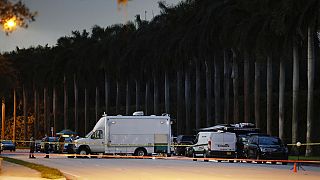 Police crime scene vehicles are seen at Trump International Golf Club after police closed off the area following the apparent assassination attempt of President Donald Trump