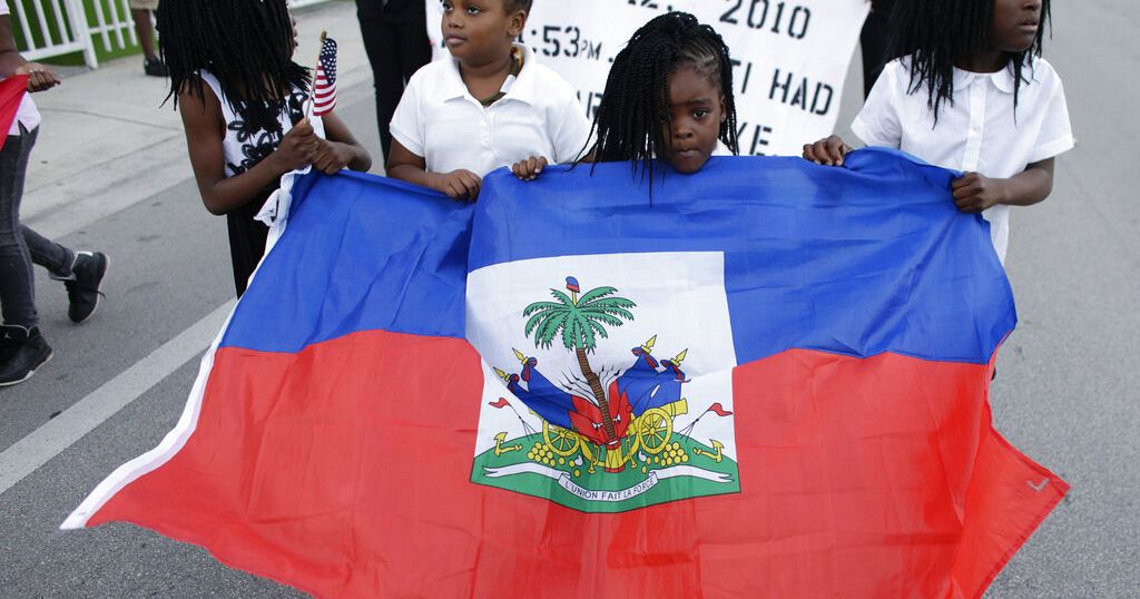 Haitians find solidarity at church after week of false pet-eating claims