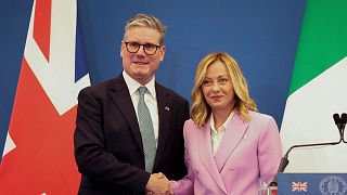 Giorgia Meloni and Keir Starmer shake hands after a joint news conference at Villa Doria Pamphilj in Rome.