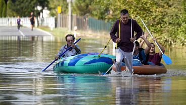 Residents paddle through a flooded street in Bohumin, Czech Republic, 17 September 2024. 