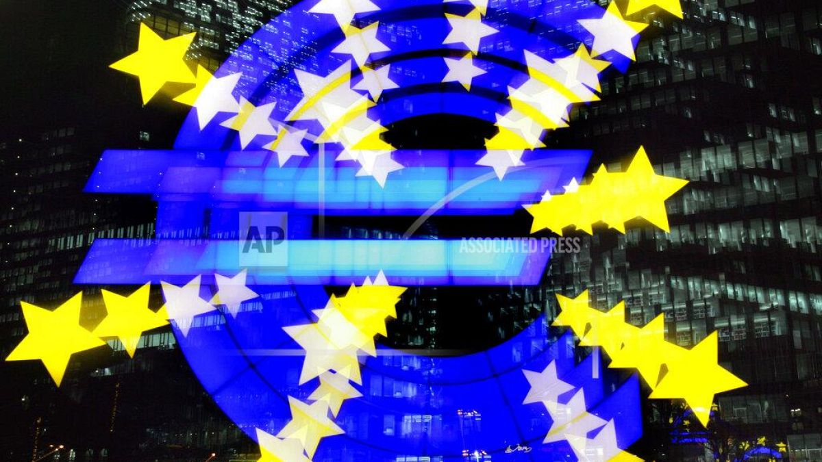 The Euro sculpture photographed with zoom is seen in front of the European Central Bank in Frankfurt, central Germany, Wednesday, Nov. 30, 2005