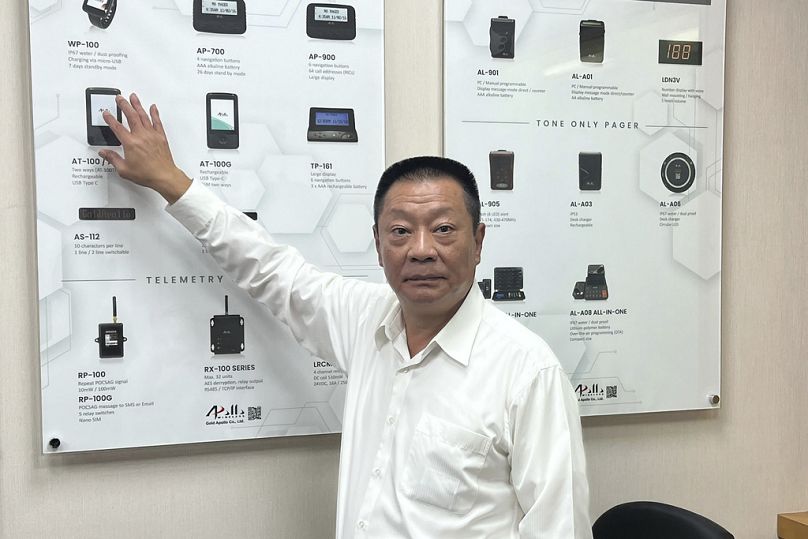 Hsu Ching-Kuang, chairman of Apollo Gold, talks about the Taiwan company's communication products at the headquarters in New Taipei City, Taiwan Wednesday, Sept. 18, 2024.