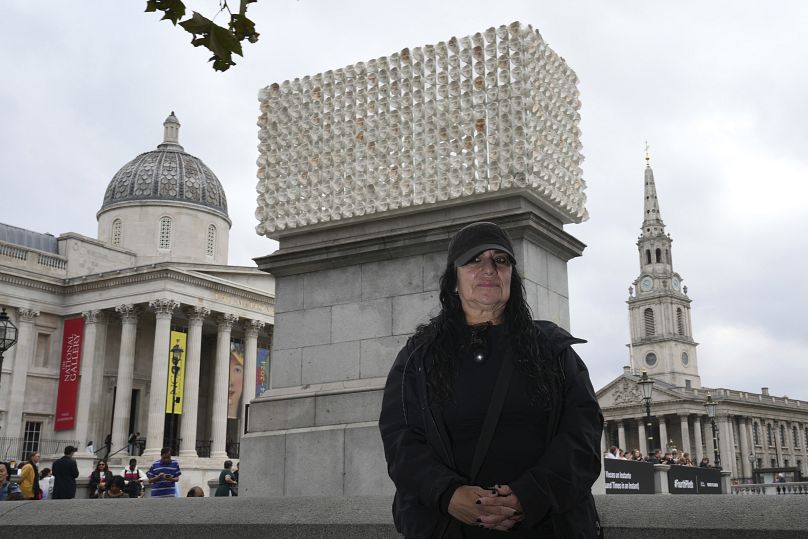 Mexican artist Teresa Margolles poses in front of her artwork "Mil Veces un Instante (A Thousand Times in an Instant)