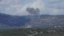 Smoke rises in northern Israel following a rocket strike from Lebanon.