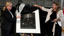 Canadian Cultural Heritage Deputy Minister Isabelle Mondou and Andrea Clark-Grignon, Head of Public Affairs, unveil 'The Roaring Lion,' a 1941 portrait of Winston Churchill