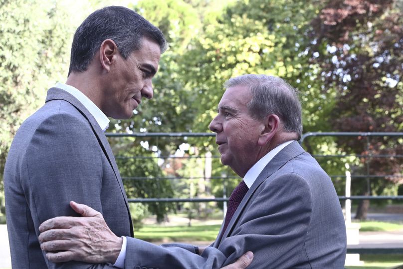 In this photo provided by the Spanish government in Madrid, Spain's Prime Minister Pedro Sanchez, left greets exiled Venezuelan opposition leader Edmundo Gonzalez at the Moncl