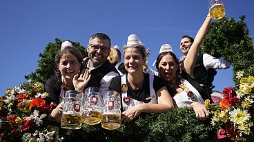 The Oktoberfest hosts arrive for the start of the 189th 'Oktoberfest' beer festival in Munich, Germany, Saturday, Sept. 21, 2024.