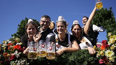 The Oktoberfest hosts arrive for the start of the 189th 'Oktoberfest' beer festival in Munich, Germany, Saturday, Sept. 21, 2024.