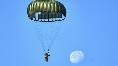 Parachutists jump over Ginkel Heath Netherlands, Sept. 21, 2024, to mark the 80th anniversary of an audacious by unsuccessful World War II mission codenamed Market Garden.