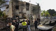 sraeli security forces examine the site hit by a rocket fired from Lebanon, in Kiryat Bialik, northern Israel, on Sunday, Sept. 22, 2024