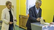 Hans-Christoph Berndt, a candidate for the AfD in the Brandenburg state elections, and his wife cast their ballots for the state election on Sunday, Sept. 22, 2024 in Potsdam,