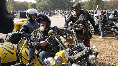 Motorcyclists arrive at the parking lots around the Roman Catholic holy shrine of Fatima to attend the IX Pilgrimage of the Blessing of Helmets that draws tens of thousands, i