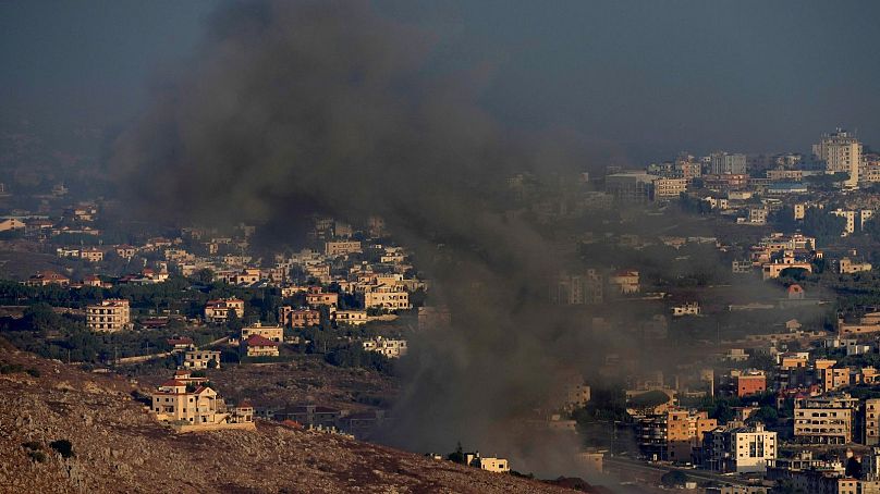 Smoke rises from an Israeli airstrike on Kfar Rouman village, south Lebanon.