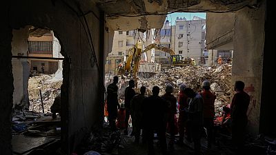 Ambulances arrive to evacuate the wounded near the site of an Israeli airstrike in Beirut's southern suburb, Monday, Sept. 23, 2024. 