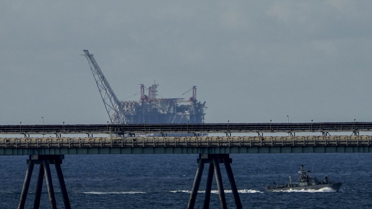 An oil platform in Israel's offshore Leviathan gas field is seen while an Israeli navy vessel patrols the Mediterranean Sea, Israel