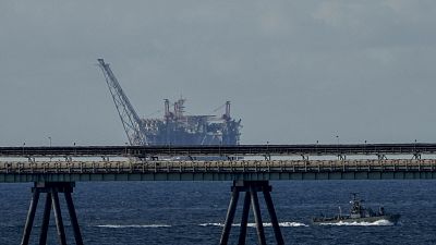 An oil platform in Israel's offshore Leviathan gas field is seen while an Israeli navy vessel patrols the Mediterranean Sea, Israel