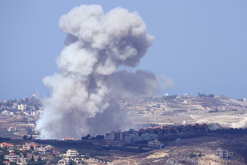 Smoke rises from Israeli airstrikes on villages in the Nabatiyeh district, seen from the southern town of Marjayoun, Lebanon, Monday, Sept. 23, 2024