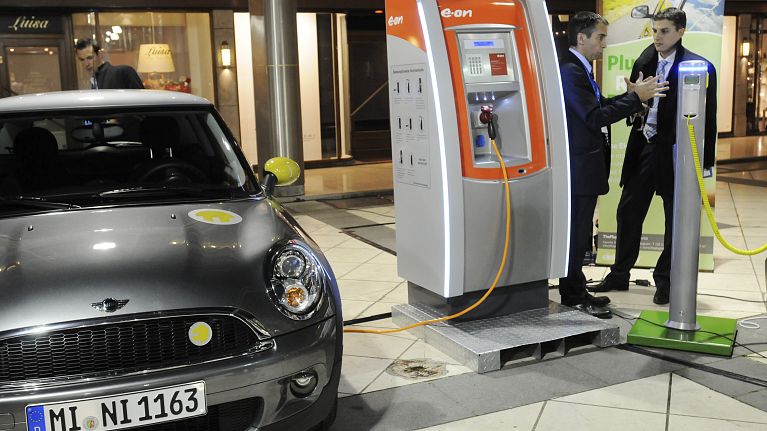 Some electric cars are seen in display in an hotel in Brussels (file)