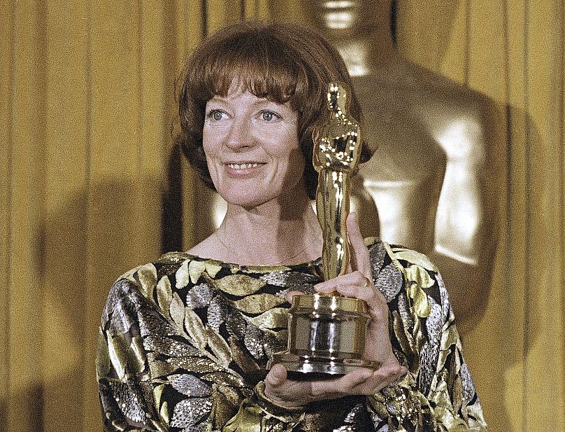 Maggie Smith holds her Oscar for best supporting actress in the film California Suite - 1979