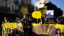 Activists carry a banner saying "Our neighbourhoods are not your businesses" during a protest against Portugal's housing crisis in Lisbon, September 28, 2024