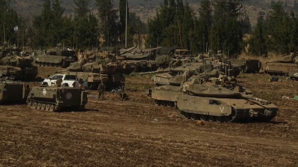 Israel deploys troops to border as fears of ground offensive in Lebanon grow