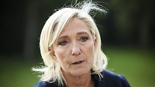 French far-right leader Marine Le Pen answers reporters at the Elysee Palace after a meeting with French President Emmanuel Macron, Aug. 26, 2024 in Paris