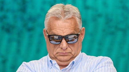 FILE: Hungarian Prime Minister Viktor Orban waits after delivering a speech at Tusvanyos Summer University, in Baile Tusnad, Harghita county, Romania, 27 July 2024