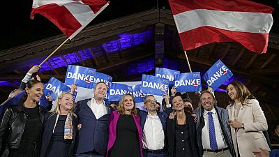 Herbert Kickl, leader of the Freedom Party of Austria poses with supporters, in Vienna, Austria, Sunday, Sept. 29, 2024, after polls closed in the country's national election. Herbert Kickl, leader of the Freedom Party of Austria poses with supporters, in Vienna, Austria, Sunday, Sept. 29, 2024, after polls closed in the country's national election.
