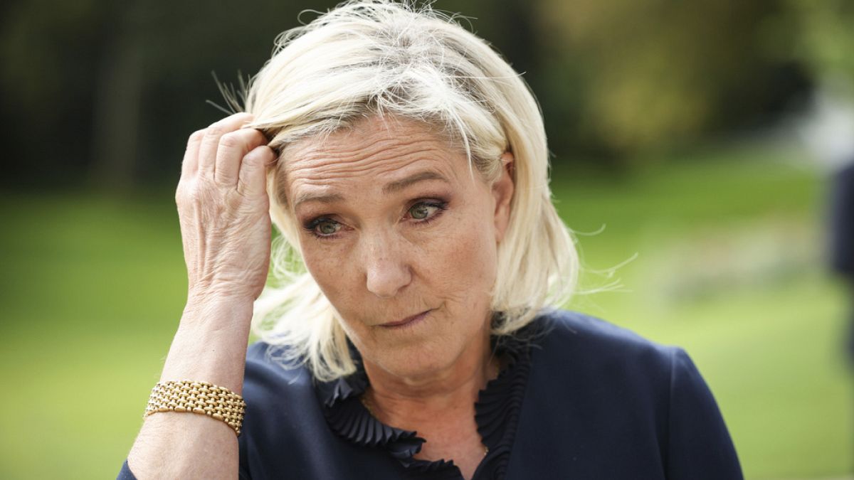 Marine Le Pen to launch legal action after father filmed singing with neo-Nazis