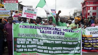 Nigeria turns 64: Tinubu vows “end of tunnel” is near, some protest economic hardship